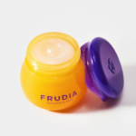 frudia blueberry hydrating honey lip balm product